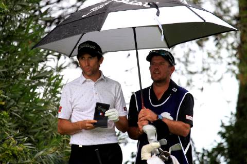 French Gregory Bourdy shelters from the rain under an umbrella along his caddy during the first round of the Golf 2018 Andalusia Valderrama Master, at the Royal Club Valderrama, in San Roque, Andalusia, Spain, 18 October 2018. Golf 2018 Andalusia Valderrama Master in San Roque !ACHTUNG: NUR REDAKTIONELLE NUTZUNG!  Copyright: xA.CarrascoxRagelx SRQ01 20181018-636754897554901432