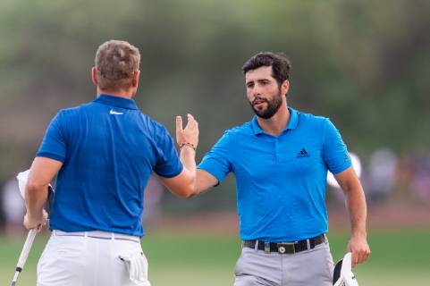 Adrian Otaegui of Spain (right) shakes hands with Jortdan Smith of England at the end of round 2 during the DP World Tour Championship at Jumeirah Golf Estates, Dubai, UAE on 16 November 2018. Copyright: xGrantxWinterx 21950158
