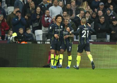 Raheem Sterling of Manchester City celebrates scoring with Leroy San? of Manchester City during the Premier League match between West Ham United and Manchester City at the Olympic Park, London, England on 24 November 2018. Copyright: xVincexxMignottx PMI-2420-0002