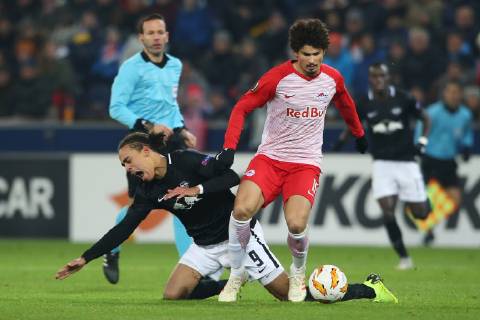 SOCCER - UEFA EL, RBS vs RB Leipzig SALZBURG,AUSTRIA,29.NOV.18 - SOCCER - UEFA Europa League, group stage, Red Bull Salzburg vs RasenBallsport Leipzig. Image shows Yussuf Poulsen (RB Leipzig) and Andre Ramalho (RBS). GEPAxpictures xMathiasxMandl