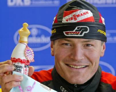 Sven Fischer shows a baby bottle during a press conference at the Biathlon World Championships in Oberhof on Monday 9 Feb 2004 The biathlete became father of a daughter on Sunday evening 8 Feb 2004 Eckehard Schulz Sven Fischer from Germany presents a baby bottle during a press conference at the Biathlon World Championships in Oberhof eastern Germany Monday Feb 9 2004 Fischer s daughter was born Sunday evening Feb 8 2004 Eckehard Schulz OBERHOF DEU