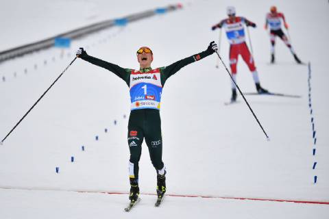 Crossing the finish line Eric FRENZEL GER Jubel Freude Begeisterung Aktion winner Sieger ahead of Jan SCHMID NOR and Franz Josef REHRL AUT Nordic combined single competition 10 km Nordic Combined LH Individual Gundersen 10km FIS Nordic Ski WM 2019 in Seefeld Austria 19 02 03 03 2019