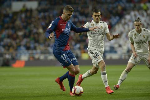 March 31, 2019 - Madrid, Madrid, Spain - Dani Ceballos of Real Madrid fight the ball with Rivera of SD Huesca during a match between Real Madrid vs SD Huesca for La Copa del Rey at Santiago Bernabeu Stadium on March 31, 2019 in Madrid, Spain. Real Madrid CF v SD Huesca - La Liga  - ZUMAn230 20190331_zaa_n230_965 Copyright: xPatricioxRealpex