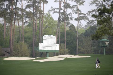 Patrons arrive and walk the golf corse in the early morning on the Monday before the 2019 Masters Tournament at Augusta National Golf Club in Augusta, Georgia, on April 8, 2019.  AUG20190408102 JOHNxANGELILLO