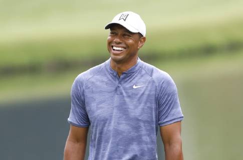 Tiger Woods smiles on the 16th green at practice on the Monday before the 2019 Masters Tournament at Augusta National Golf Club in Augusta, Georgia, on April 8, 2019.  AUG20190408125 JOHNxANGELILLO