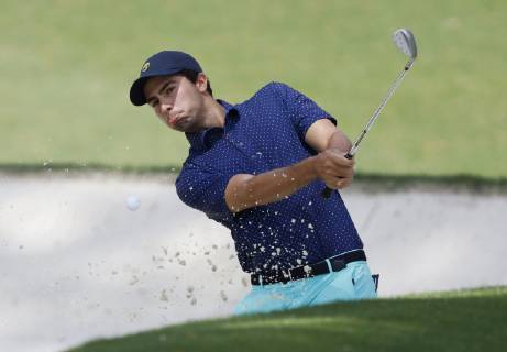 Alvaro Ortiz of Mexico hits out of a bunker on the 10th green at practice on the Tuesday before the 2019 Masters Tournament at Augusta National Golf Club in Augusta, Georgia, on April 9, 2019.  AUG20190409122 JOHNxANGELILLO
