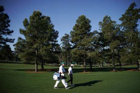 Tommy Fleetwood of the United Kingdom walks to his tee ball at practice on the Wednesday before the 2019 Masters Tournament at Augusta National Golf Club in Augusta, Georgia, on April 10, 2019.  AUG20190410117 JOHNxANGELILLO