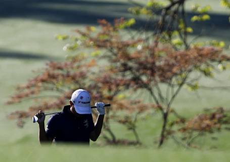 Satoshi Kodaira of Japan walks with his head down to the 13th green at practice on the Wednesday before the 2019 Masters Tournament at Augusta National Golf Club in Augusta, Georgia, on April 10, 2019.  AUG20190410107 JOHNxANGELILLO