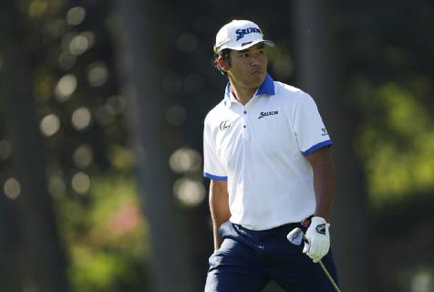 Hideki Matsuyama of Japan looks at the 13th green at practice on the Wednesday before the 2019 Masters Tournament at Augusta National Golf Club in Augusta, Georgia, on April 10, 2019.  AUG20190410108 JOHNxANGELILLO