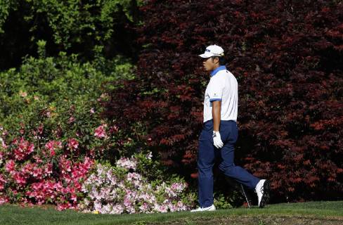 Hideki Matsuyama of Japan walks to the 13th green at practice on the Wednesday before the 2019 Masters Tournament at Augusta National Golf Club in Augusta, Georgia, on April 10, 2019.  AUG20190410110 JOHNxANGELILLO