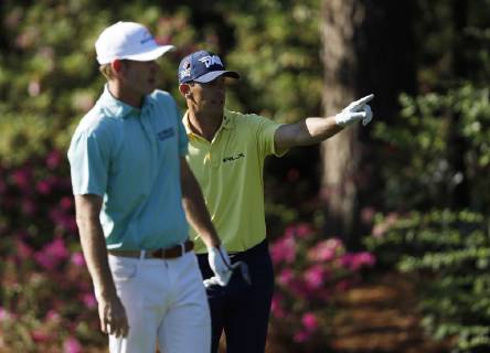 Billy Horschel and Brad Snedeker look at the 13th green at practice on the Wednesday before the 2019 Masters Tournament at Augusta National Golf Club in Augusta, Georgia, on April 10, 2019.  AUG20190410111 JOHNxANGELILLO
