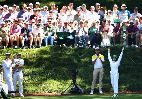 Sergio Garcia of Spain watches Angela Akins Garcia react after a tee shot on the 9th hole at the Par 3 Contest on the Wednesday before the 2019 Masters Tournament at Augusta National Golf Club in Augusta, Georgia, on April 10, 2019.  AUG20190410913 KEVINxDIETSCH