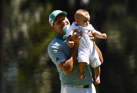 Sergio Garcia of Spain holds daughter Azalea Adele Garcia during the Par 3 Contest on the Wednesday before the 2019 Masters Tournament at Augusta National Golf Club in Augusta, Georgia, on April 10, 2019.  AUG20190410916 KEVINxDIETSCH