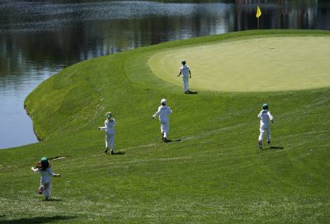 Children of Jason Day and Webb Simpson run to the 2nd green at the Par 3 Contest on the Wednesday before the 2019 Masters Tournament at Augusta National Golf Club in Augusta, Georgia, on April 10, 2019.  AUG20190410735 JOHNxANGELILLO