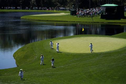 Children of Jason Day and Webb Simpson run to the 2nd green at the Par 3 Contest on the Wednesday before the 2019 Masters Tournament at Augusta National Golf Club in Augusta, Georgia, on April 10, 2019.  AUG20190410737 JOHNxANGELILLO