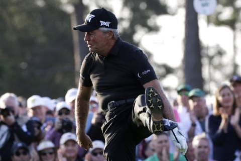 Gary Player does a leg kick after his tee shot on the first tee when he and Jack Nicklaus hit the ceremonial first tee ball before the first round at the 2019 Masters Tournament at Augusta National Golf Club in Augusta, Georgia, on April 11, 2019.  AUG20190411101 JOHNxANGELILLO