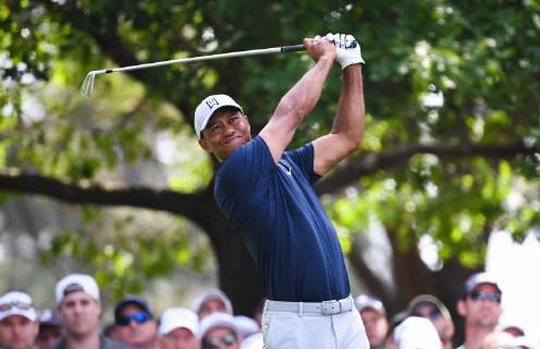 Tiger Woods watches his shot on the 4th tee during the first round of the Masters Tournament at Augusta National Golf Club in Augusta, Georgia, on April 11, 2019.  AUG20190411342 KEVINxDIETSCH