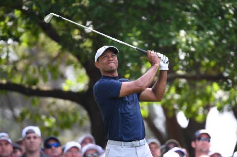 Tiger Woods watches his shot on the 4th tee during the first round of the Masters Tournament at Augusta National Golf Club in Augusta, Georgia, on April 11, 2019.  AUG20190411343 KEVINxDIETSCH