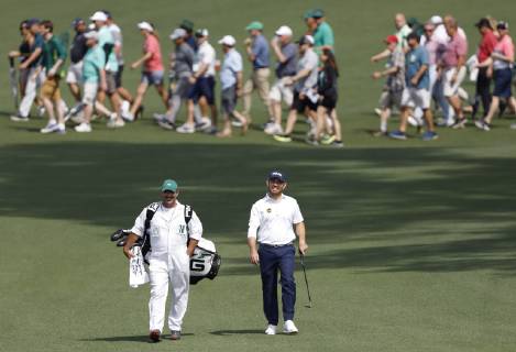 Louis Oosthuizen walks up the 2nd hole fairway in the first round at the 2019 Masters Tournament at Augusta National Golf Club in Augusta, Georgia, on April 11, 2019.  AUG20190411120 JOHNxANGELILLO