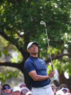 Tiger Woods watches his shot on the 4th tee during the first round of the Masters Tournament at Augusta National Golf Club in Augusta, Georgia, on April 11, 2019.  AUG20190411344 KEVINxDIETSCH
