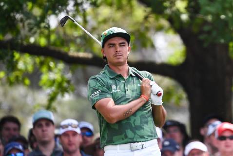 Rickie Fowler watches his tee shot off of the fourth tee during the first round of the Masters Tournament at Augusta National Golf Club in Augusta, Georgia, on April 11, 2019.  AUG20190411355 KEVINxDIETSCH