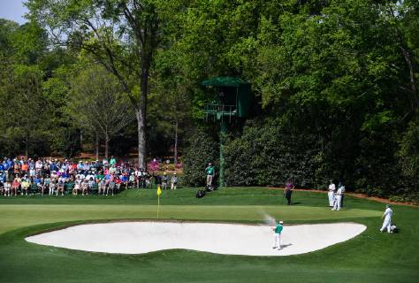 Hideki Matsuyama hits from a bunker on the fourth hole during the first round of the Masters Tournament at Augusta National Golf Club in Augusta, Georgia, on April 11, 2019.  AUG20190411326 KEVINxDIETSCH