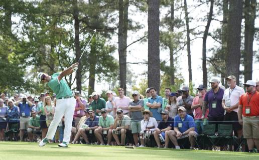 Golf: Masters Tournament Hideki Matsuyama of Japan hits a tee shot on the fourth hole during the first round of the Masters Tournament at Augusta National Golf Club in Augusta, Georgia, on April 11, 2019. 