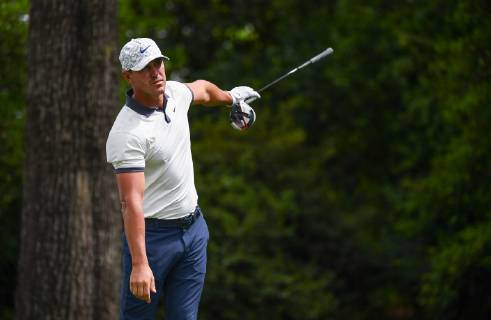 Brooks Koepka reacts to an errant drive off of the second tee during the second round of the Masters Tournament at Augusta National Golf Club in Augusta, Georgia, on April 12, 2019.  AUG20190412318 KEVINxDIETSCH