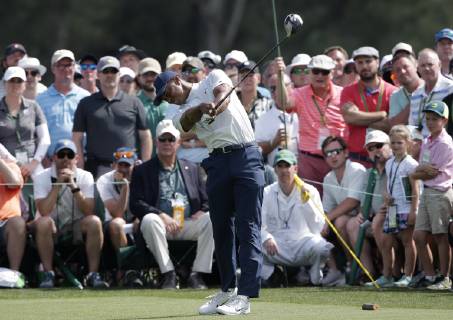 Tiger Woods hits his tee shot on the 8th hole in the second round at the 2019 Masters Tournament at Augusta National Golf Club in Augusta, Georgia, on April 12, 2019.  AUG20190412119 JOHNxANGELILLO