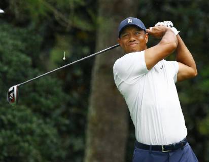 Golf: Masters Tournament Tiger Woods tees off on the 15th hole during the second round of the Masters Tournament at Augusta National Golf Club in Augusta, Georgia, on April 12, 2019. 