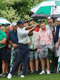 Golf: Masters Tournament Tiger Woods hits his second shot on the 14th hole during the second round of the Masters Tournament at Augusta National Golf Club in Augusta, Georgia, on April 12, 2019. 