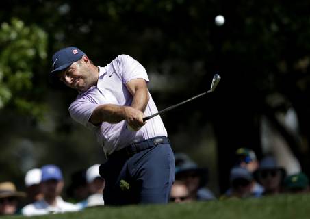 Francesco Molinari of Italy hits a tee shot on the 4th hole in the third round at the 2019 Masters Tournament at Augusta National Golf Club in Augusta, Georgia, on April 13, 2019.  AUG20190413907 JOHNxANGELILLO