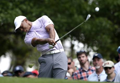 Tiger Woods hits a tee shot on the 4th hole in the third round at the 2019 Masters Tournament at Augusta National Golf Club in Augusta, Georgia, on April 13, 2019.  AUG20190413908 JOHNxANGELILLO