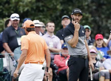 Dustin Johnson reacts after missing a putt for birdie on the 1st hole in the final round at the 2019 Masters Tournament at Augusta National Golf Club in Augusta, Georgia, on April 14, 2019.  AUG20190414911 JOHNxANGELILLO