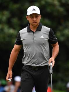 Xander Schauffele lines up a putt on the first green during the final round of the Masters Tournament at Augusta National Golf Club in Augusta, Georgia, on April 14, 2019.  AUG20190414306 KEVINxDIETSCH