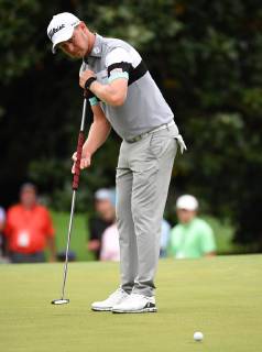 Justin Harding putts on the first green during the final round of the Masters Tournament at Augusta National Golf Club in Augusta, Georgia, on April 14, 2019.  AUG20190414307 KEVINxDIETSCH