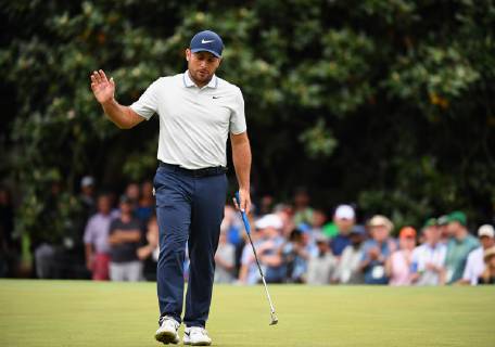 Francesco Molinari acknowledges the patrons after putting on the first green during the final round of the Masters Tournament at Augusta National Golf Club in Augusta, Georgia, on April 14, 2019.  AUG20190414321 KEVINxDIETSCH