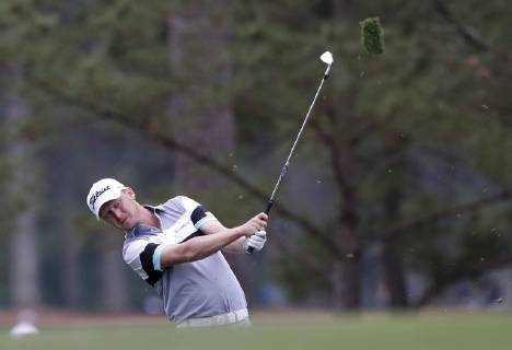 Justin Harding hits his approach shot on the 1st hole in the final round at the 2019 Masters Tournament at Augusta National Golf Club in Augusta, Georgia, on April 14, 2019.  AUG20190414903 JOHNxANGELILLO