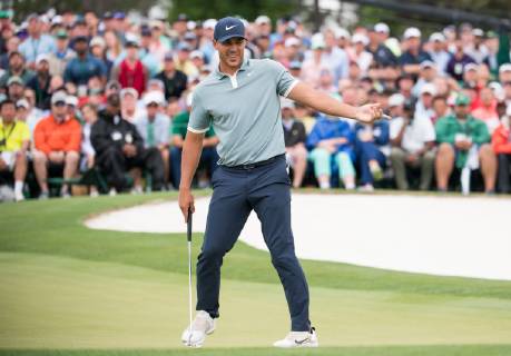Brooks Koepka reacts to a missed putt on the 18th green during the final round of the Masters Tournament at Augusta National Golf Club in Augusta, Georgia, on April 14, 2019.  AUG20190414352 KEVINxDIETSCH
