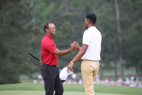 Tiger Woods (USA) shakes hands with Tony Finau on the 18th hole during the final round of the 2019 Masters golf tournament at the Augusta National Golf Club in Augusta, Georgia, United States, on April 14, 2019. Noxthirdxpartyxsales  (101271187)