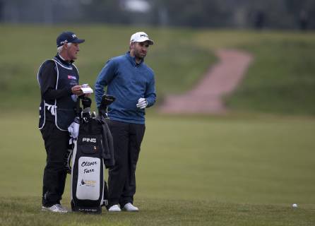 10th May 2019, Hillside Golf Club, Southport, England; Betfred British Masters, hosted by Tommy Fleetwood, day 2; Oliver Farr (WAL) consults his caddie on the fairway on the par four 8th hole  ActionPlus12132898 DavidxBlunsden