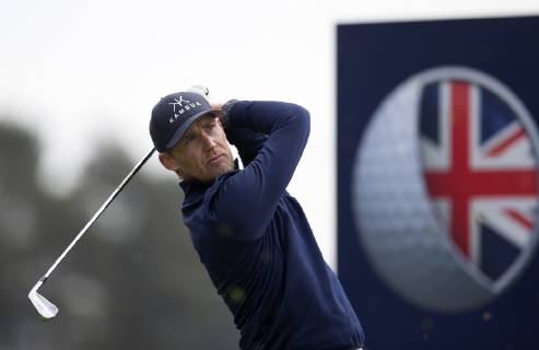 10th May 2019, Hillside Golf Club, Southport, England; Betfred British Masters, hosted by Tommy Fleetwood, day 2; Niklas Lemke (SWE) leading the tournament before the suspension of play at 10 under par, hits a long iron to the green on the par three 4th hole  ActionPlus12132907 DavidxBlunsden