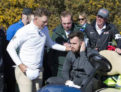 11th May 2019, Hillside Golf Club, Southport, England; Betfred British Masters, hosted by Tommy Fleetwood, day 3; Matt Wallace (ENG) speaks with a spectator who required first aid after he was hit on the back of the neck by Wallace s tee shot on the par four 15th hole  ActionPlus12133760 DavidxBlunsden