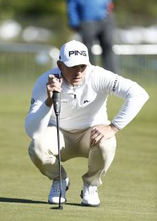 11th May 2019, Hillside Golf Club, Southport, England; Betfred British Masters, hosted by Tommy Fleetwood, day 3; Matt Wallace (ENG) lines up his putt on the 18th green before finishing with a share of the overnight lead on 14 under par  ActionPlus12133878 AlanxMartin