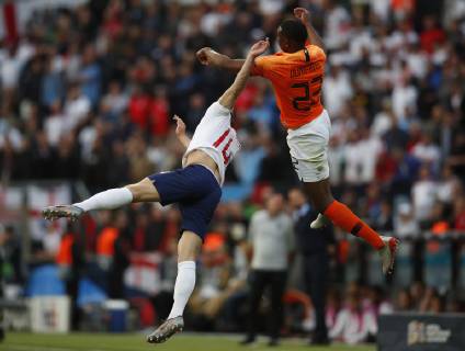 Ben Chilwell of England clashes with Denzel Dumfries of Netherlands during the UEFA Nations League match at D. Afonso Henriques Stadium, Guimaraes. Picture date: 6th June 2019. Picture credit should read: David Klein Sportimage EDITORIAL USE ONLY. No use with unauthorised audio, video, data, fixture lists, club league logos or live services. Online in-match use limited to 120 images, no video emulation. No use in betting, games or single club league player publications. SPI-0093-0076
