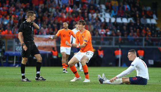 Netherlands v England UEFA Nations League Semi-Final Marten de Roon of Netherlands appeals to referee Clement Turpin after fouling Ross Barkley of England during the UEFA Nations League Semi-Final match at Estadio D. Afonso Henrique, Guimaraes Content Not Available For UK Newspapers Copyright: xPaulxChestertonx FIL-13327-0057