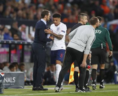 Gareth Southgate manager of England takes off Jadon Sancho of England during the UEFA Nations League match at D. Afonso Henriques Stadium, Guimaraes. Picture date: 6th June 2019. Picture credit should read: David Klein Sportimage EDITORIAL USE ONLY. No use with unauthorised audio, video, data, fixture lists, club league logos or live services. Online in-match use limited to 120 images, no video emulation. No use in betting, games or single club league player publications. SPI-0093-0082