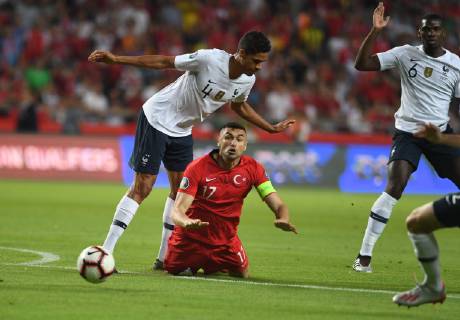 France™s Raphael Varane and Turkey™s Burak Yilmaz during Euro 2020 group H qualifying soccer match between Turkey and France at the Konya City Stadium in Konya, Turkey, June 8, 2019.  Copyright: AbdurrahmanxAntakyali 16395222