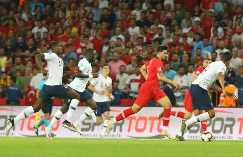 Ozan Tufan of Turkey and Paul Pogba 6 , Moussa Sissoko 17 , Raphael Varane of France during the Euro 2020 football qualification match between Turkey and France at the Buyuksehir Belediyesi stadium in Konya, on June 8, 2019. 