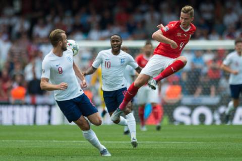 Guimaraes, Portugal, 09 06 2019, UEFA Nations League, 3 Place, Switzerland England, Harry Kane England , Raheem Sterling England and Nico Elvedi Switzerland battle for the ball Defodi 09 531 002167 Defodi-531